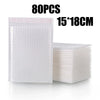 A stack of 80 pieces of white padded bubble mailers, measuring 15x18cm each.