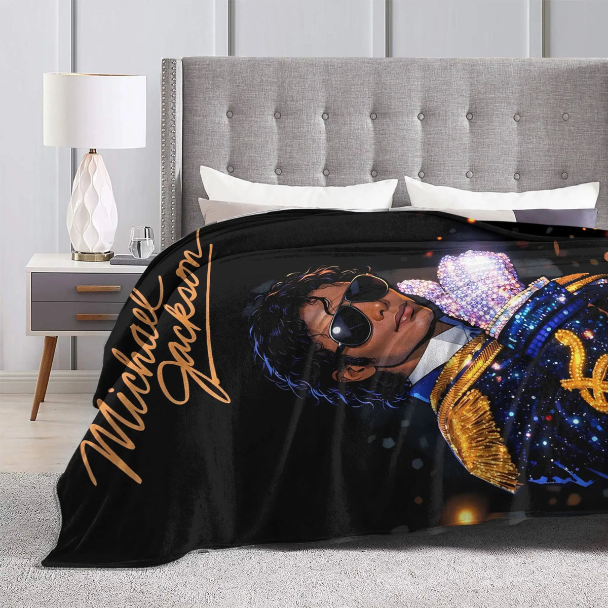 A black throw blanket featuring a graphic of Michael Jackson sleeping.