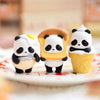 Blind box panda figure in white and black icing on a yellow waffle cone