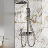 A modern shower fixture with a handheld showerhead is mounted on a white marble-effect tiled wall.
