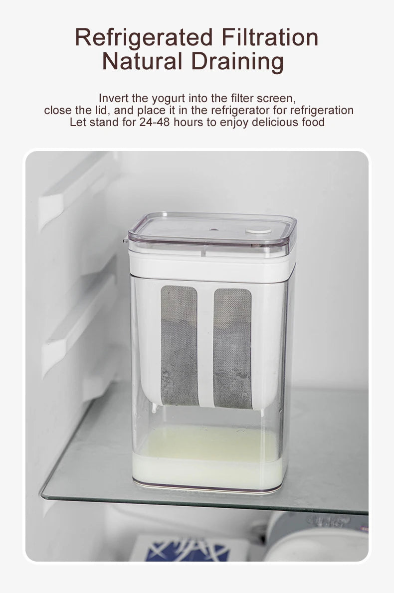 A clear plastic yogurt strainer with a fine mesh filter is placed inside a refrigerator for natural draining.