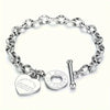 Bracelet en acier inoxydable avec pendentif double cœur