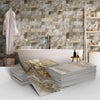 Stacks of marble self-adhesive wall stickers in various shades and patterns displayed against a textured gray wall.