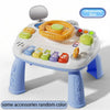 A white baby interactive activity table featuring a steering wheel, various colored buttons, and accessories.