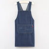 A navy blue striped denim cross-back apron hanging on a wooden hanger.