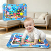 A baby is kneeling on an inflatable ocean-themed water play mat with colorful sea creatures.
