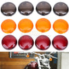 A set of various colored LED turn signal light lens covers for Harley Davidson motorcycles.