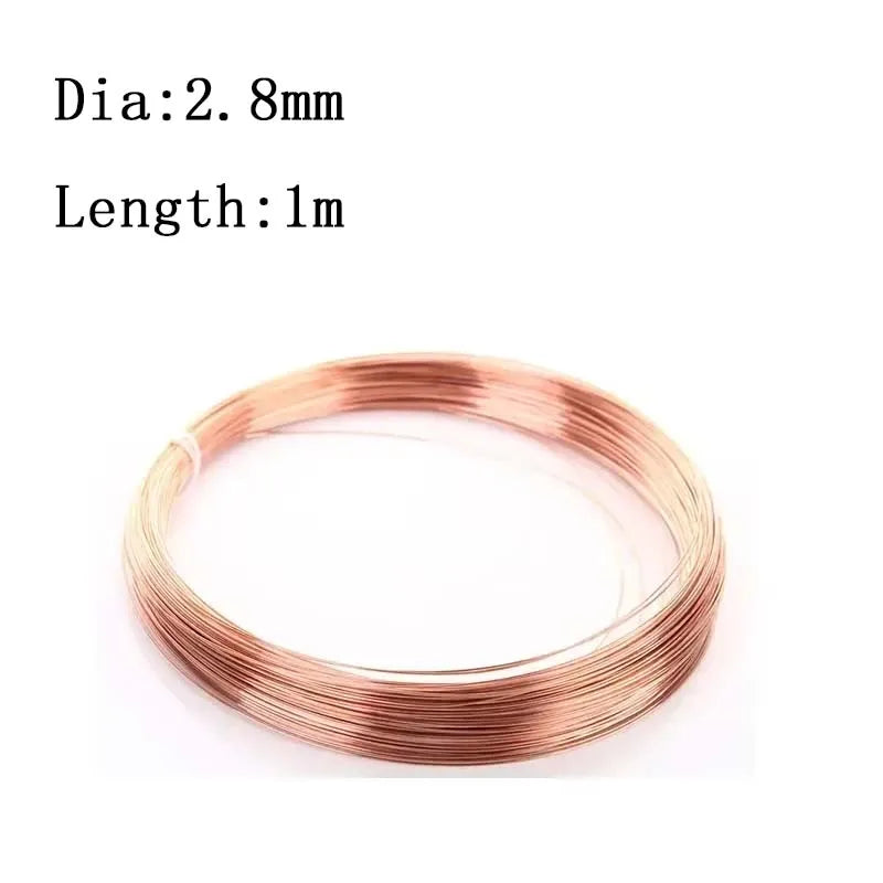 A coil of rose gold-colored enameled copper wire for jewelry making and electrical projects.
