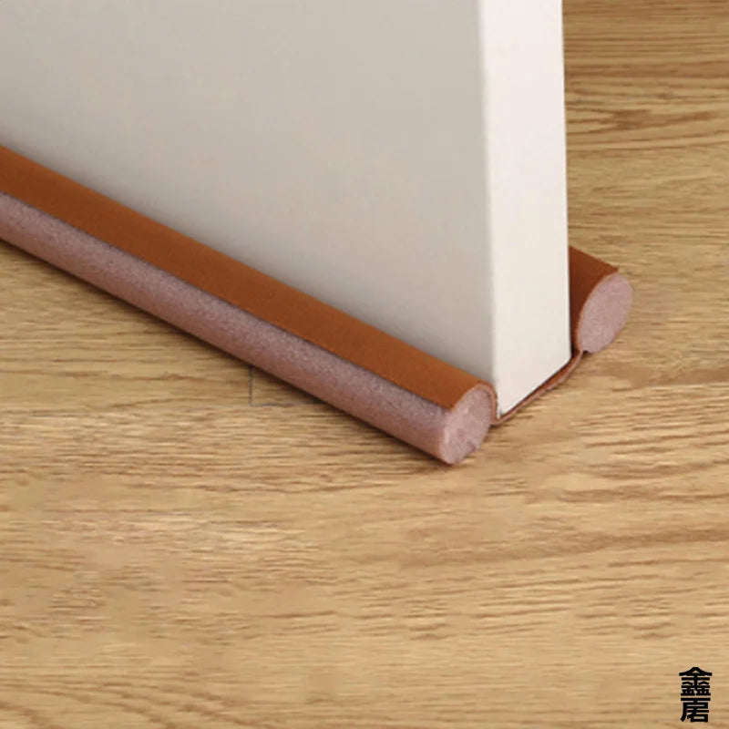 A cross-section view of a door and window sealing strip, featuring a white frame and an orange foam weatherstripping applied 