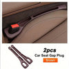 A pair of brown car seat gap plugs designed to fill gaps in car seats.