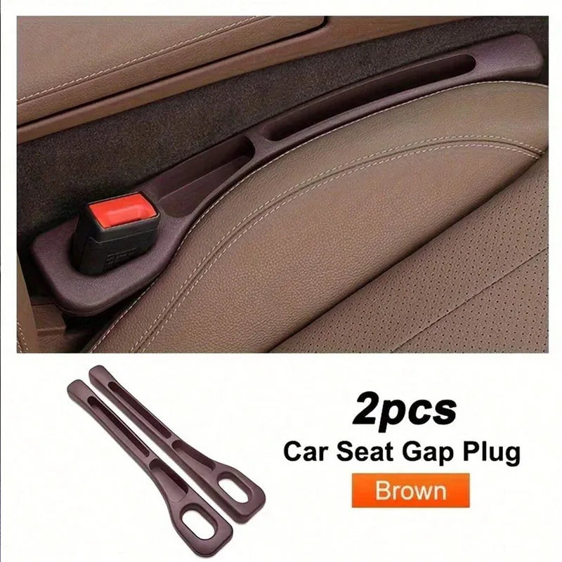 A pair of brown car seat gap plugs designed to fill gaps in car seats.