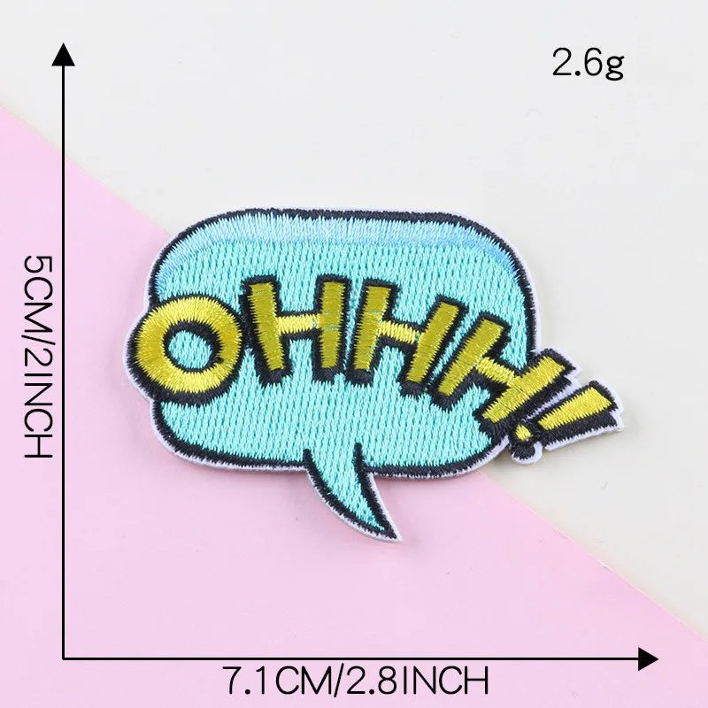 Light blue embroidered lettering patch shaped like a speech bubble with the word OHHH