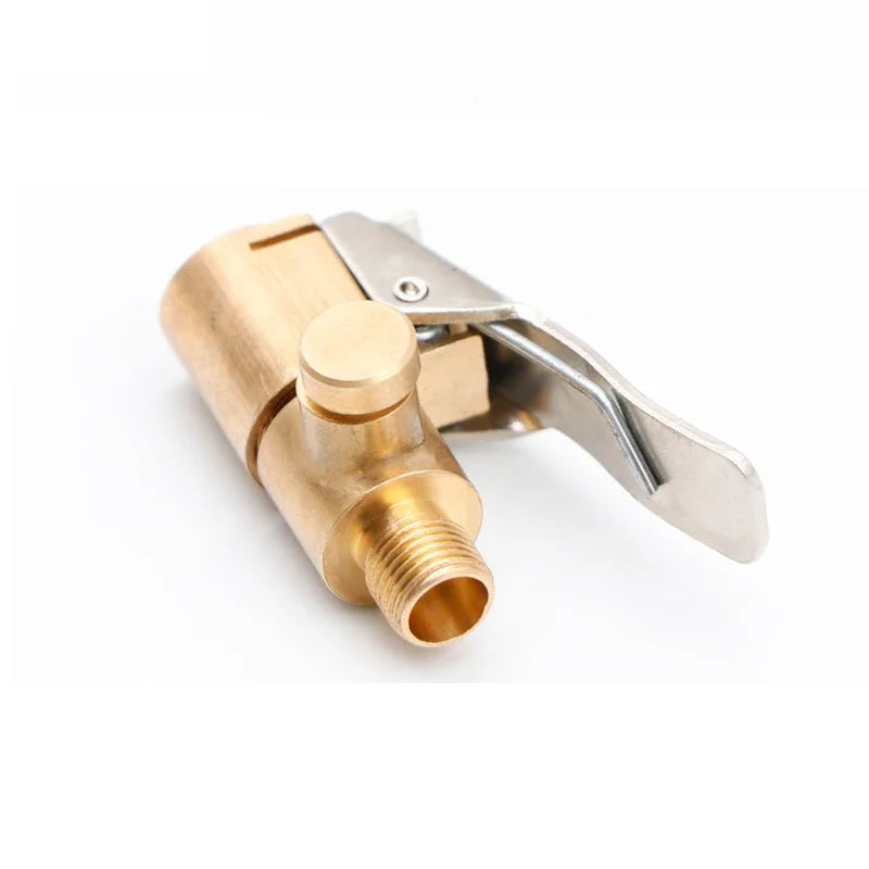 Brass tire inflator chuck with a clip-on valve connector and metal clip.