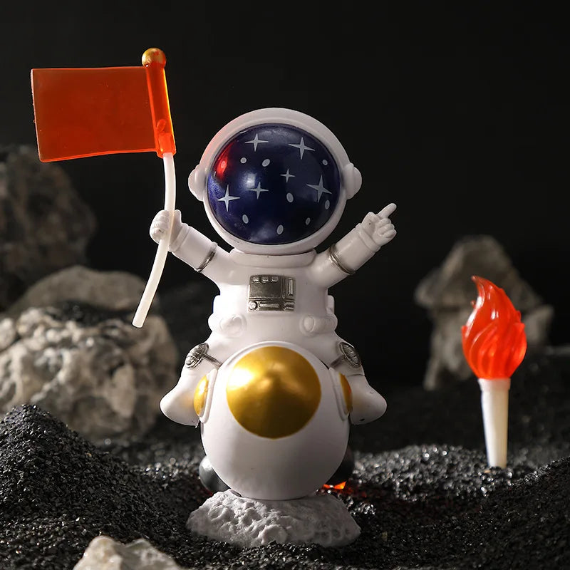 Handcrafted astronaut figurine resin spaceman desk decor with an orange flag and a glowing detail