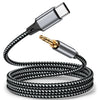 A black and white braided USB-C to 3.5mm audio adapter cable with a metallic connector.