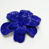 A vibrant royal blue crystal rhinestone flower sew-on patch for clothing and accessories.