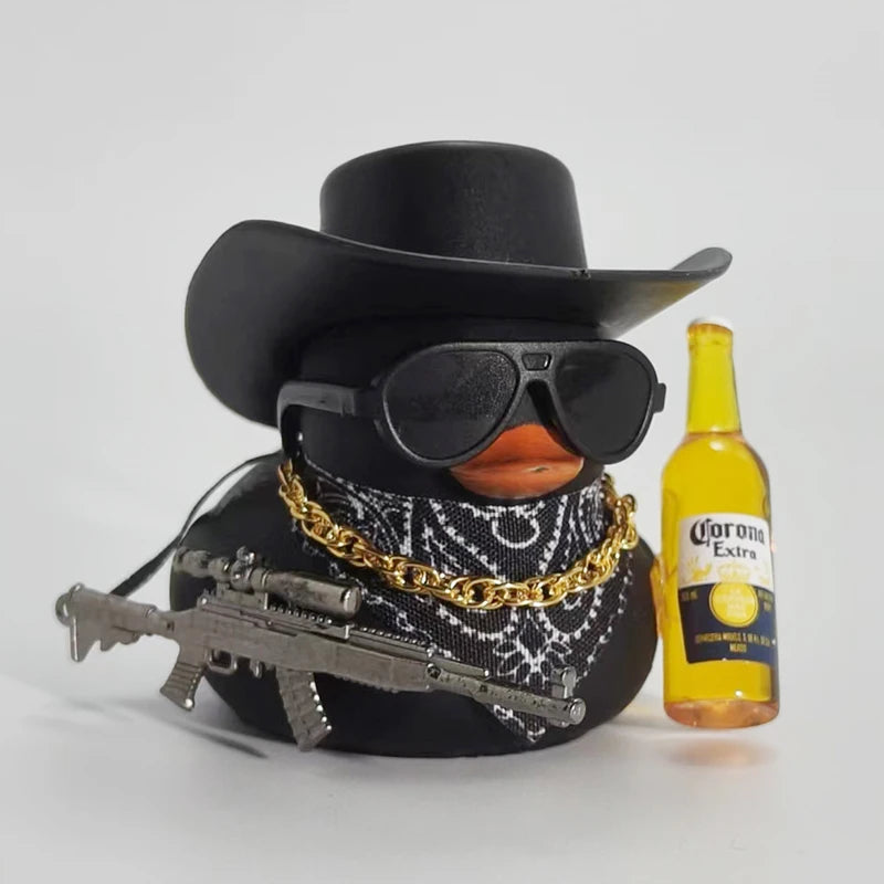 A black rubber duck shaped like a cowboy with a hat and sunglasses is shown next to a bottle of Corona Extra.