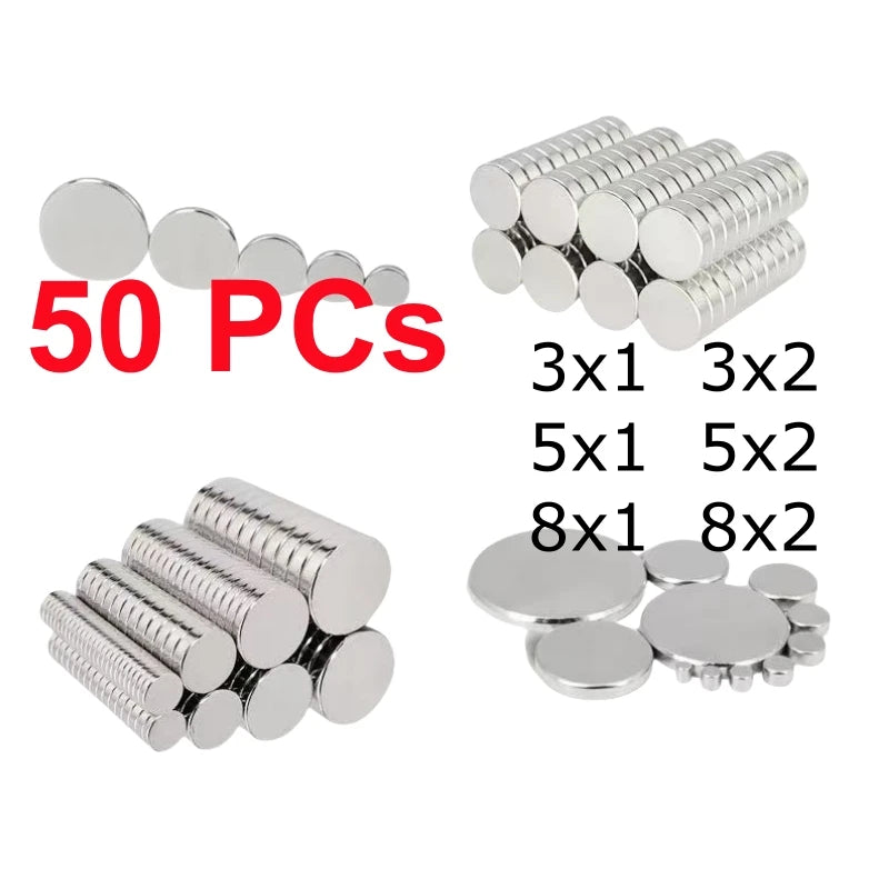 A collection of round silver neodymium disc magnets in various sizes and configurations for crafts and DIY projects.