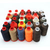 A collection of various colored heavy-duty nylon bonded thread spools arranged in a row.