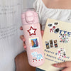 A pink Y2K retro graffiti sticker pack is held against a light background.