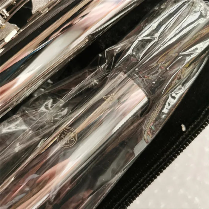 Silver-plated 16-hole flute in C key with E mechanism inside a black case.