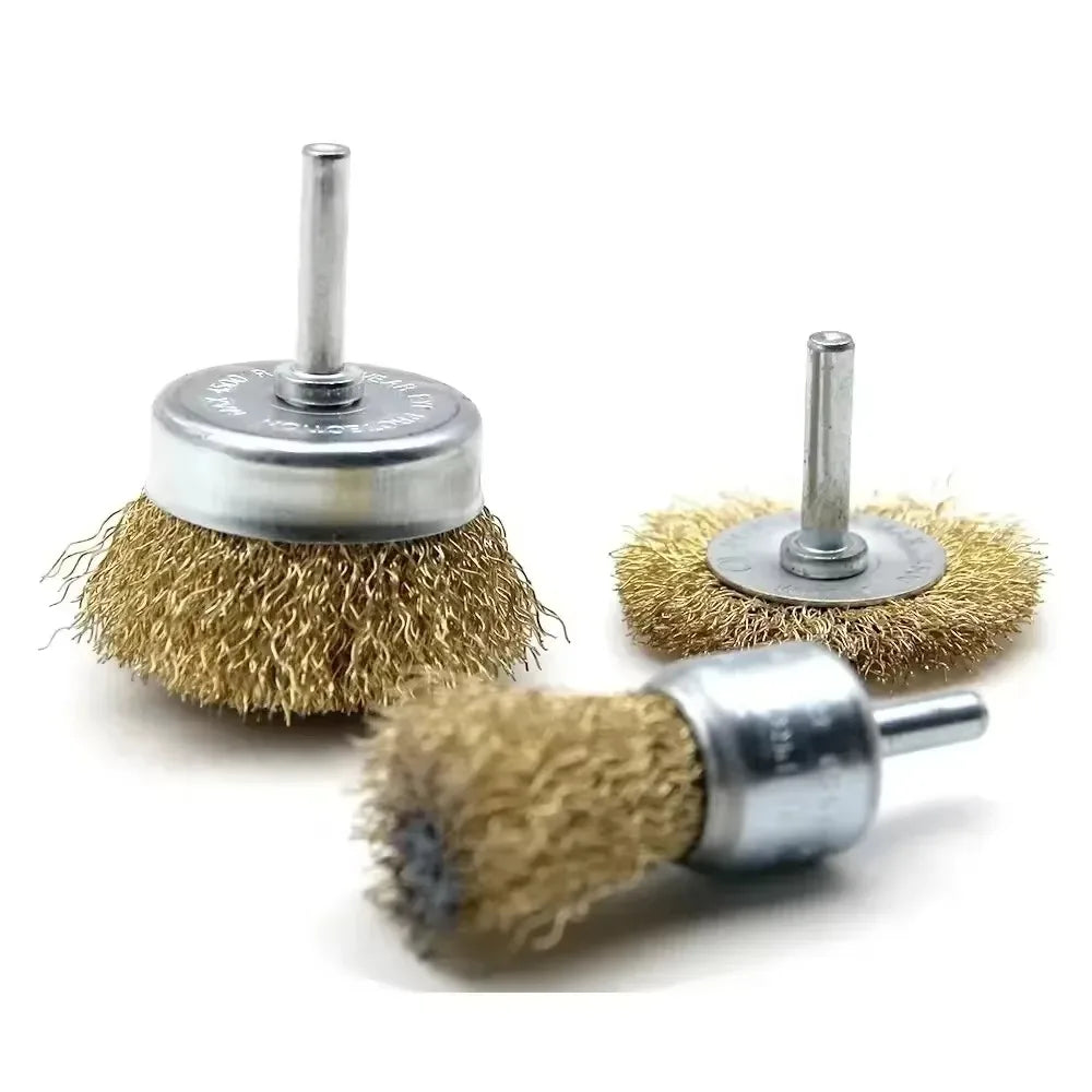 A set of steel wire brush wheels with metal shafts for rust removal and polishing.
