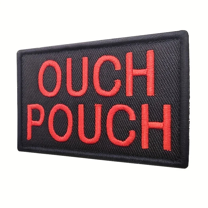 Black embroidered morale patch with orange text reading OUCH POUCH