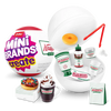 A set of Krusky Creme mini brands and a white bowl with a yellow donut and red tool.