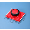 A red paint edger brush with a black handle is shown on a blue surface, demonstrating its size.