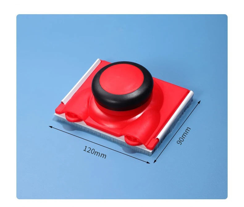 A red paint edger brush with a black handle is shown on a blue surface, demonstrating its size.