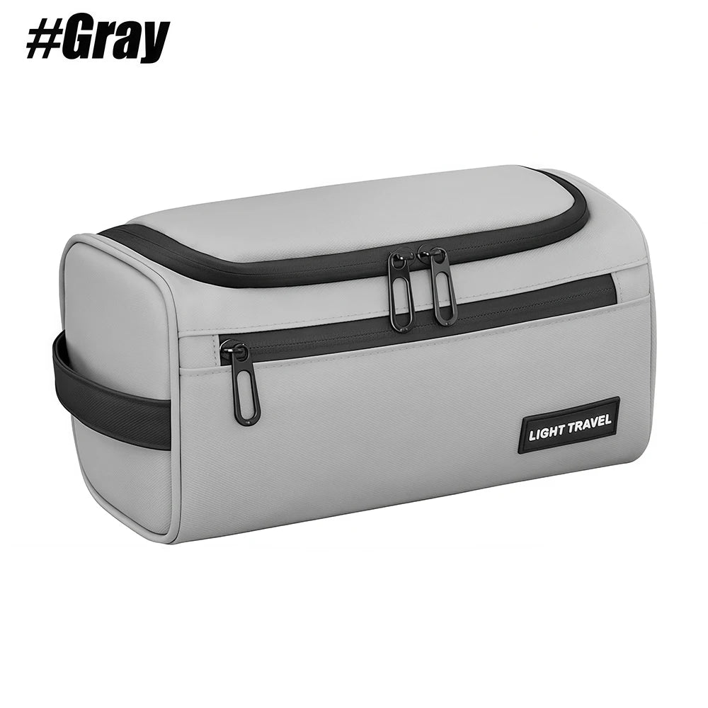 A gray men's water-resistant travel toiletry bag with a black trim and zipper details.