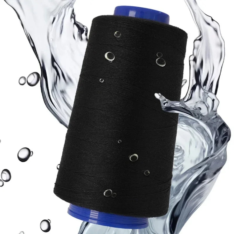 A roll of black heavy-duty waterproof bonded polyester thread is being washed or splashed with water.