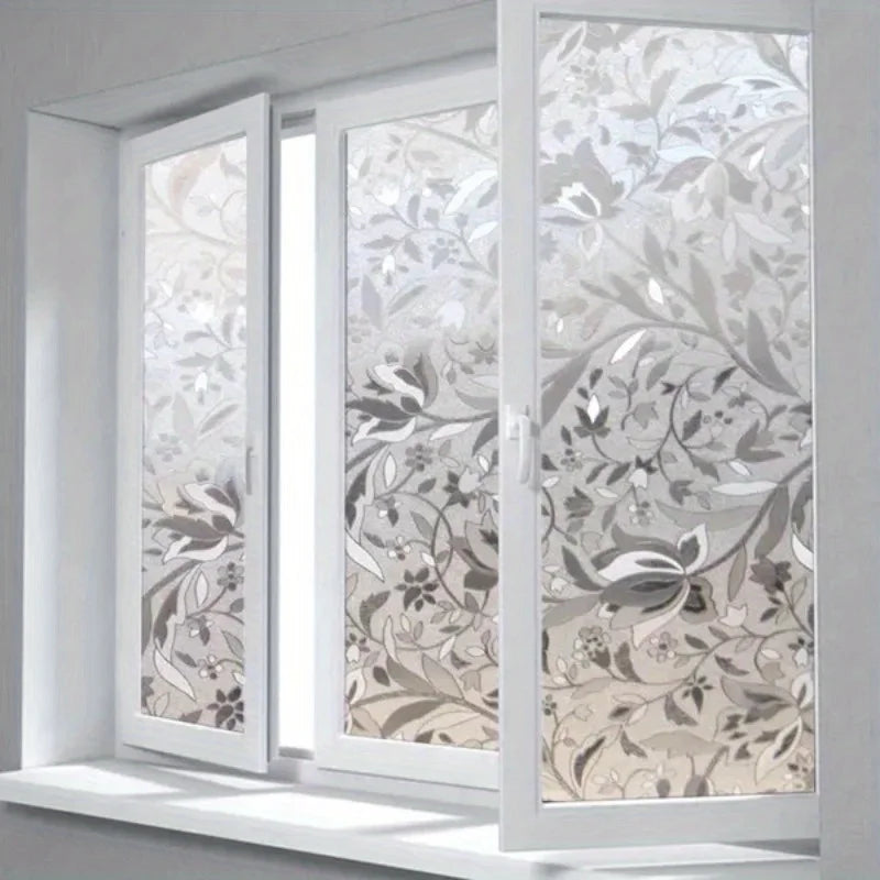 Elegant tulip privacy window film featuring floral patterns on a white window pane.