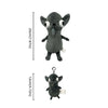 A small, dark gray plush chihuahua dog pendant with large eyes and a nose.