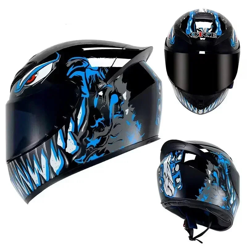 A black motorcycle helmet featuring a blue and gray graphic design with an aggressive face mask.
