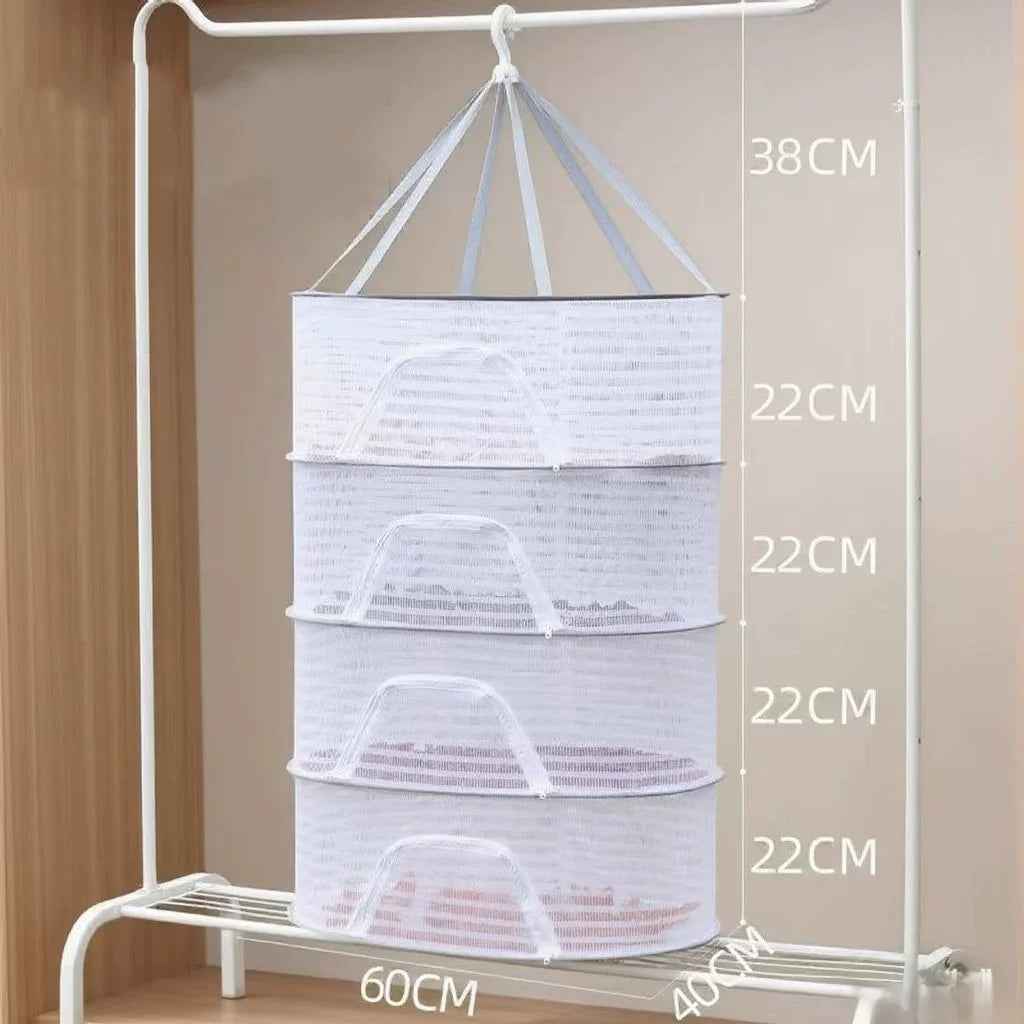 A white folding hanging drying net with mesh protection is displayed on a rack, showing various sizes and dimensions.