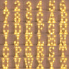 A grid of illuminated letters spelling out the alphabet used as a decorative night light for home and party decor