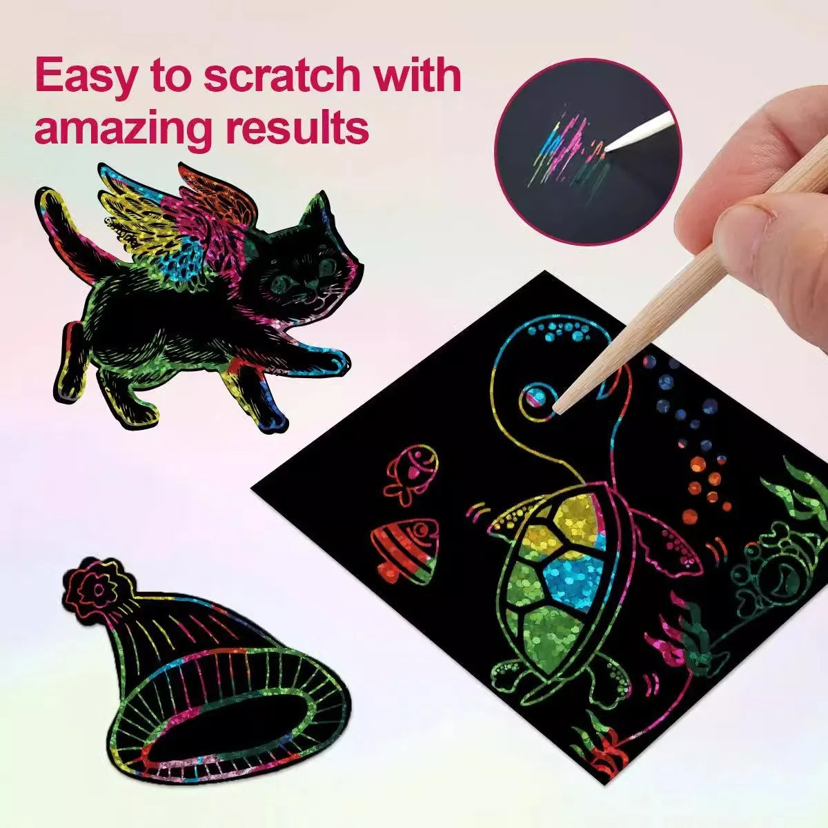 A hand uses a wooden stylus to scratch colorful designs onto black paper, demonstrating easy results.
