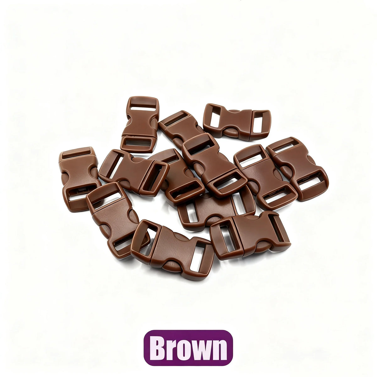 A pile of brown plastic side-release buckles for paracord bracelet projects.
