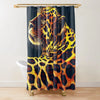 A dark curtain featuring a vibrant yellow and black leopard print hanging from a wooden rod.