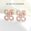 Round Cut Moissanite Stud Earrings in Sterling Silver