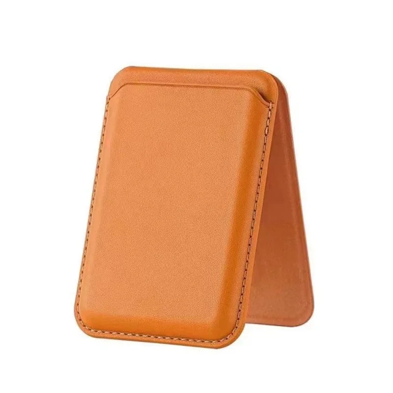 A tan leather wallet case with a magnetic closure and kickstand for an iPhone.