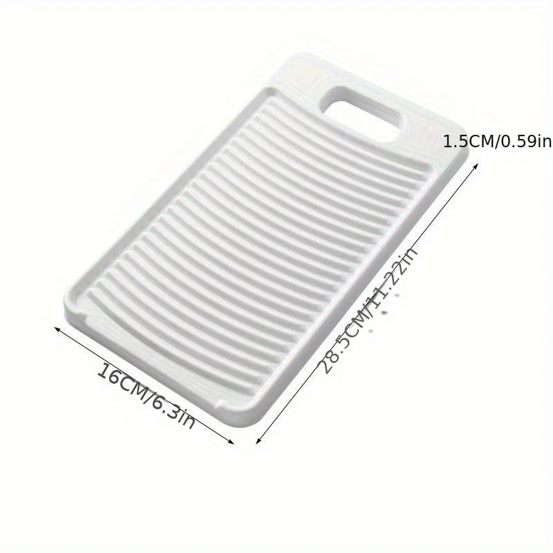 White non-slip laundry scrubbing board with a handle and ribbed surface.