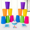 A set of colorful plastic cups in purple, orange, yellow, and green are displayed with matching cards on a white table.