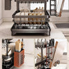 A black 2-tier kitchen countertop drying rack with an auto-draining tray and detachable holders for chopsticks and a cutting 