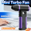 Schwarzer und violetter Mini-Turbo-Lüfter neben einer Laptop-Tastatur, mit 6000mAh Akku und 150.000 U/min Geschwindigkeit her