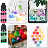 A collection of liquid candle dyes in various vibrant colors including purple, blue, pink, and green.