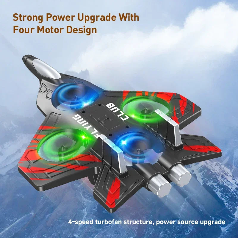 A black and red EPP foam RC stunt plane with four glowing thrusters in flight against a cloudy sky.