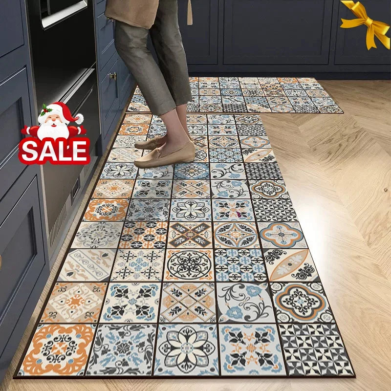 A rectangular floor mat featuring a geometric pattern of beige, blue, and white tiles on a light wood floor.