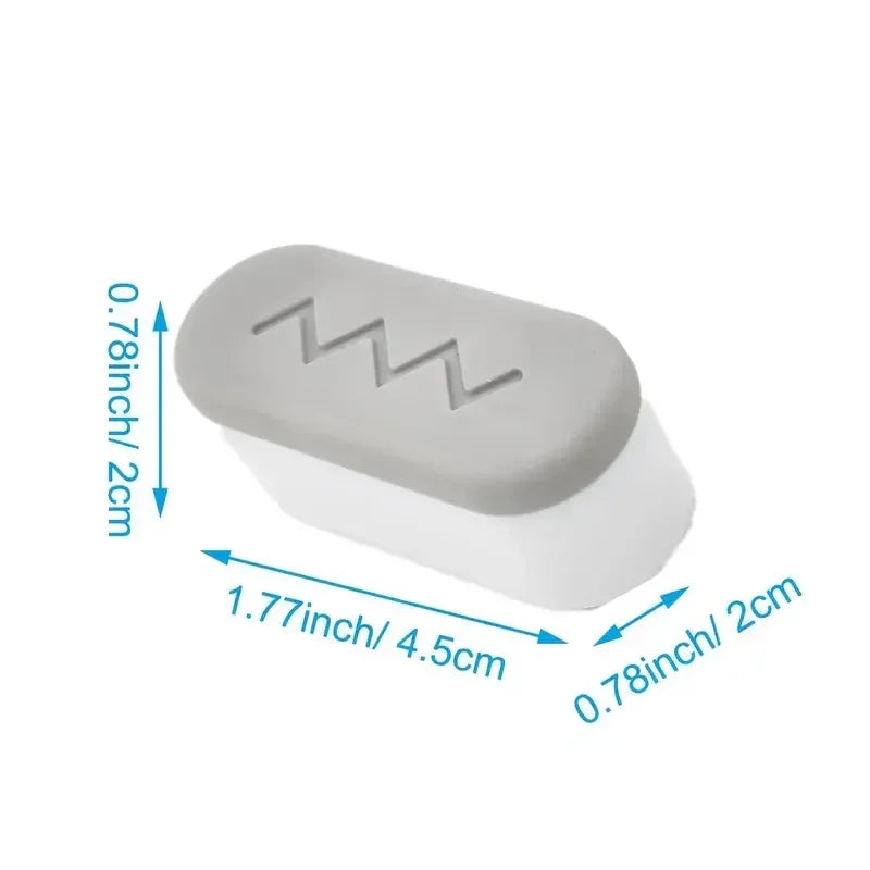 A white silicone toilet seat bumper with a wavy texture, shown from the side.